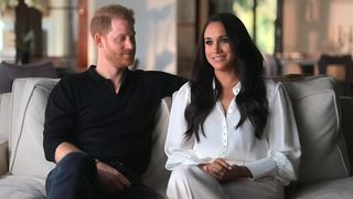 Prince Harry looks at Meghan Markle in the docuseries Harry & Meghan.