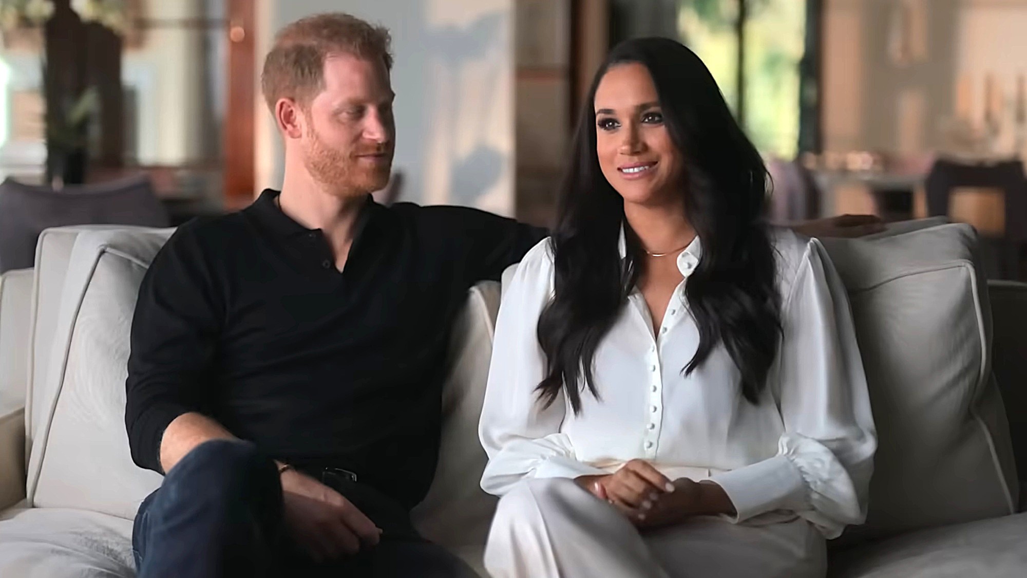 Prince Harry looks at Meghan Markle in the docuseries Harry &amp; Meghan.