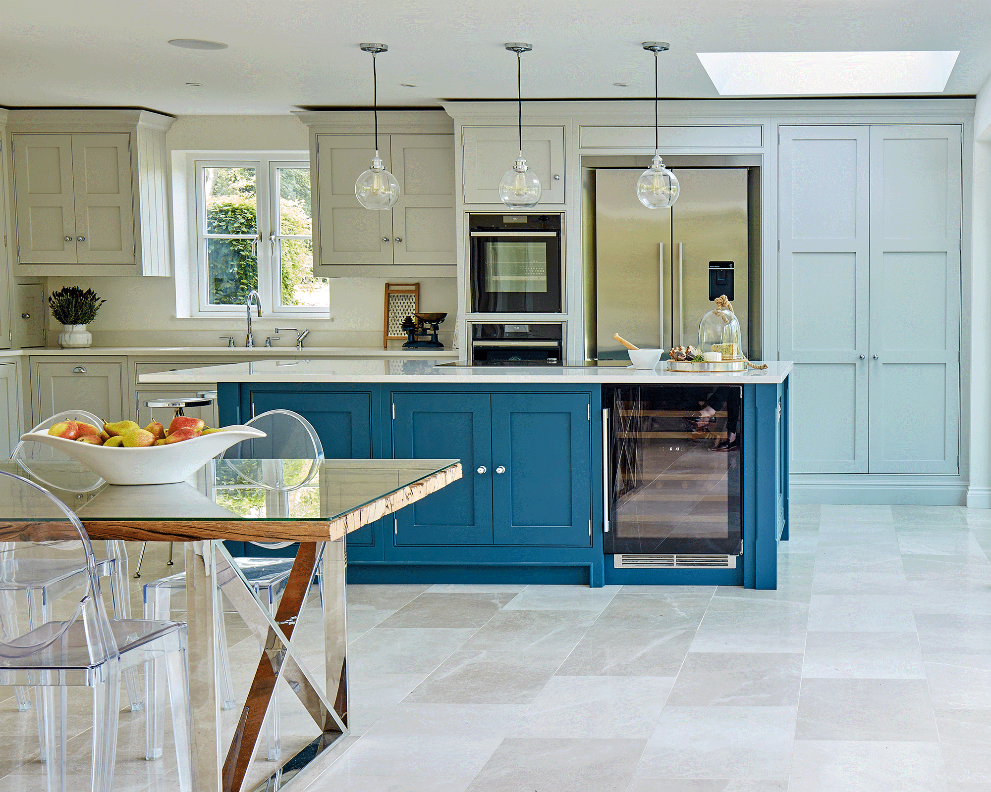 Blue kitchen with blue kitchen island