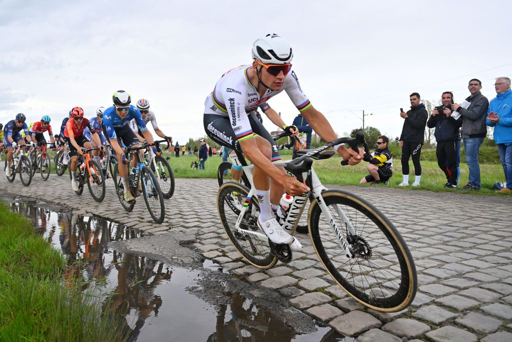 ROUBAIX FRANCE APRIL 07 Mathieu van der Poel of The Netherlands and Team Alpecin Deceuninck competes passing through the Hornaing Wandignies cobblestones sector during the 121st ParisRoubaix 2024 a 2597km one day race from Compiegne to Roubaix UCIWT on April 07 2024 in Roubaix France Photo by Luc ClaessenGetty Images