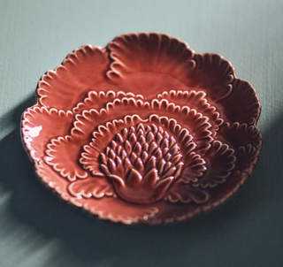 A pink floral canape plate
