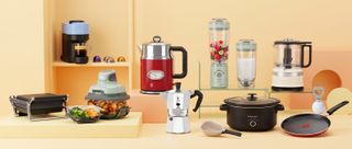 Kitchen appliances on gradient background