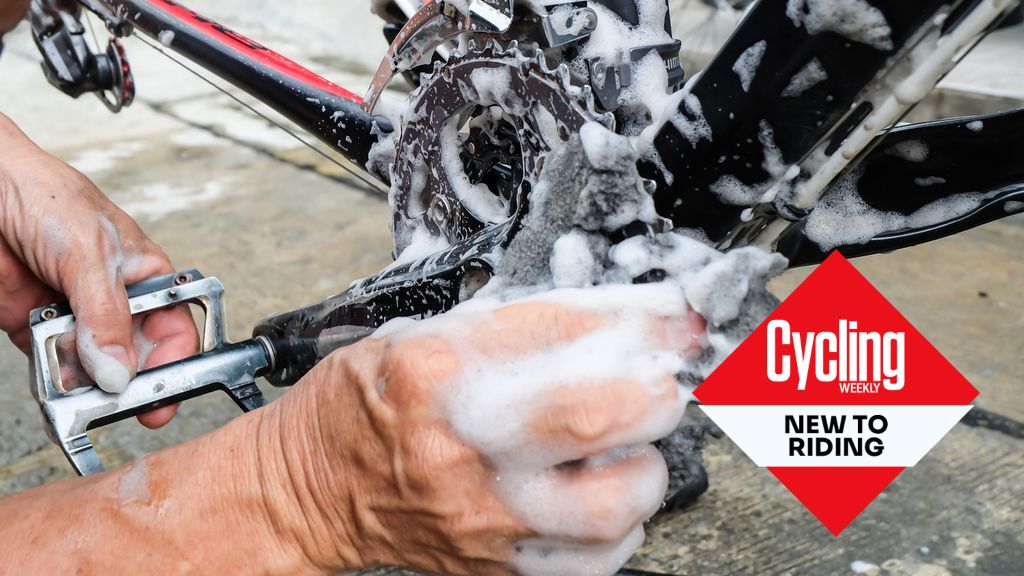 Cyclist cleans a drivetrain