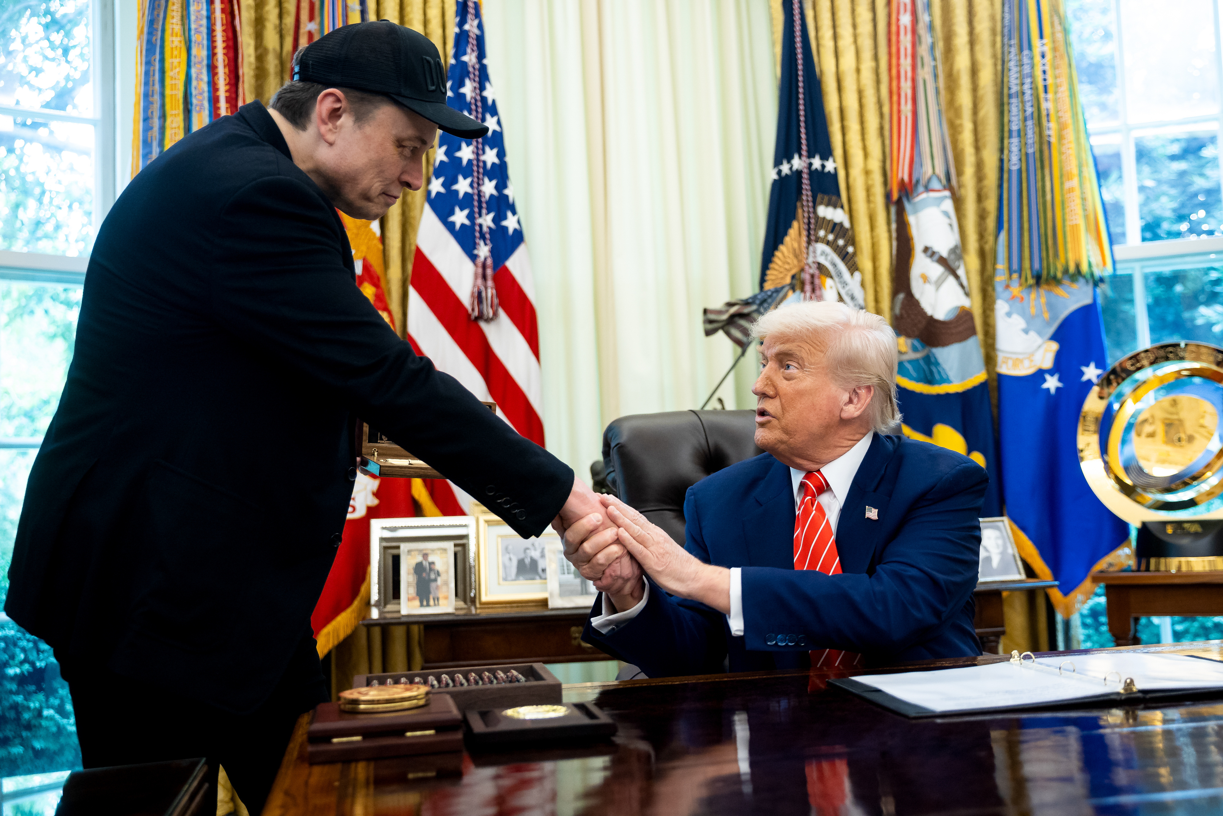 Donald Trump and Elon Musk seen in the White House at the time of DOGE.