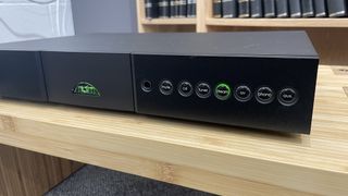 Naim Nait XS3 on wooden rack