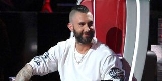 adam levine smiling the voice chair