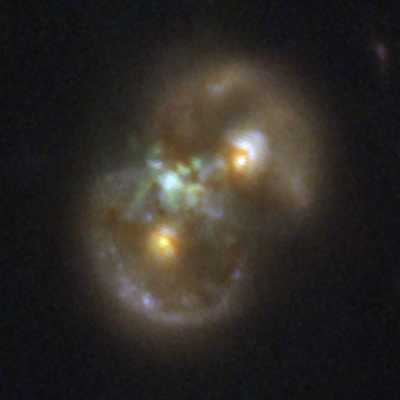 The Infinity Galaxy, the result of two colliding spiral galaxies, is composed of two rings of stars (seen as ovals at upper right and lower left).