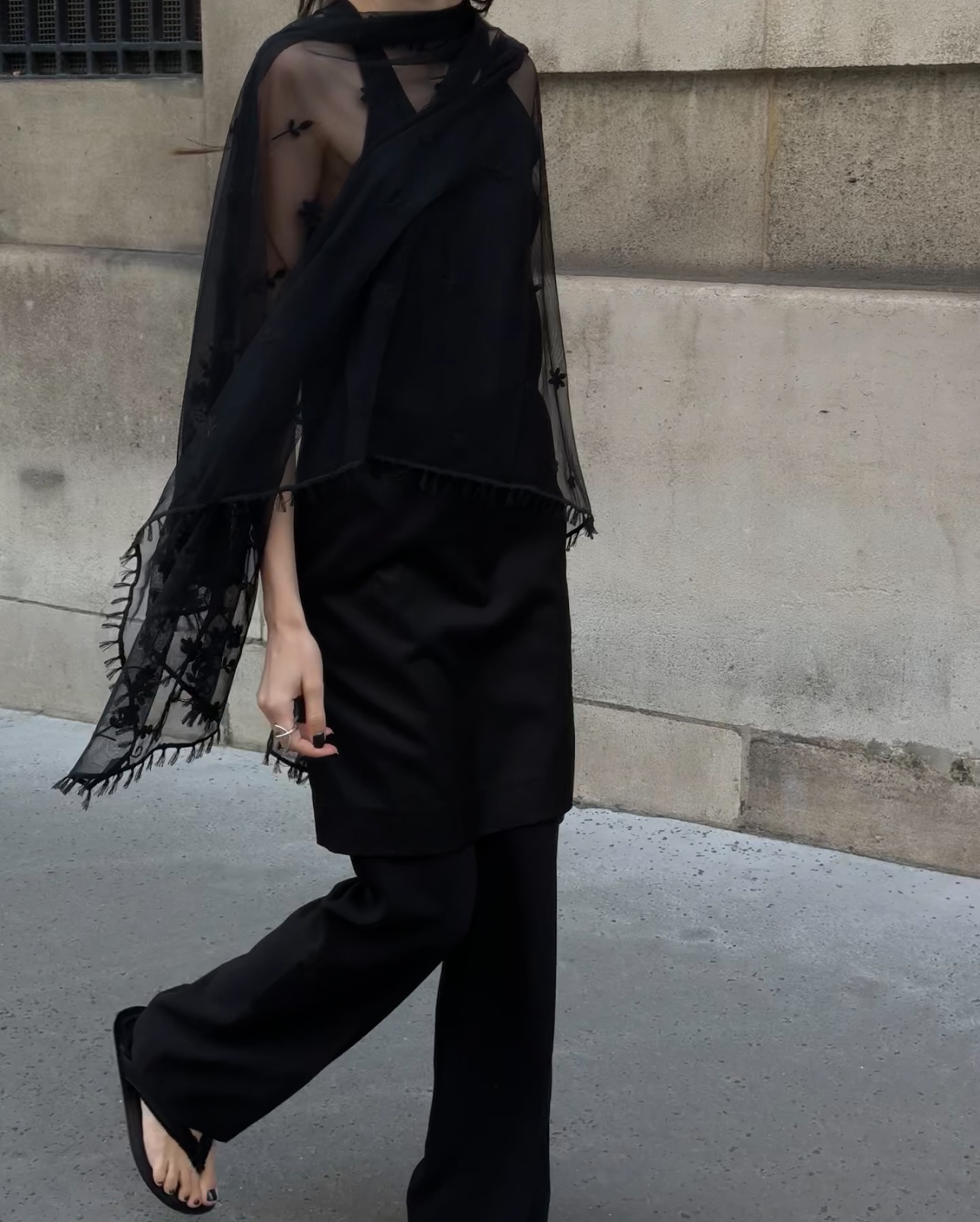 An image of @beatrice.gutu wearing flare leggings with tassel tops, one of the biggest trends to wear with leggings in 2026.