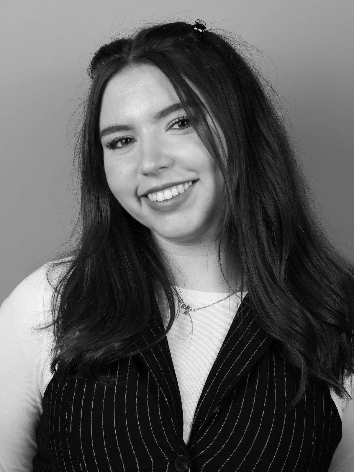 A photo of a woman taken on a Canon EOS R5 Mark II camera.