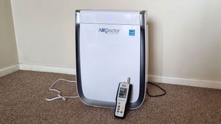 AirDoctor AD3500 next to an air particle monitor