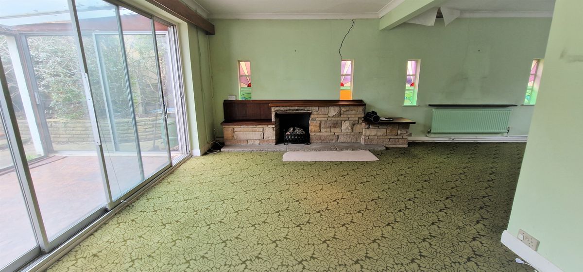 The lounge has a stone fireplace