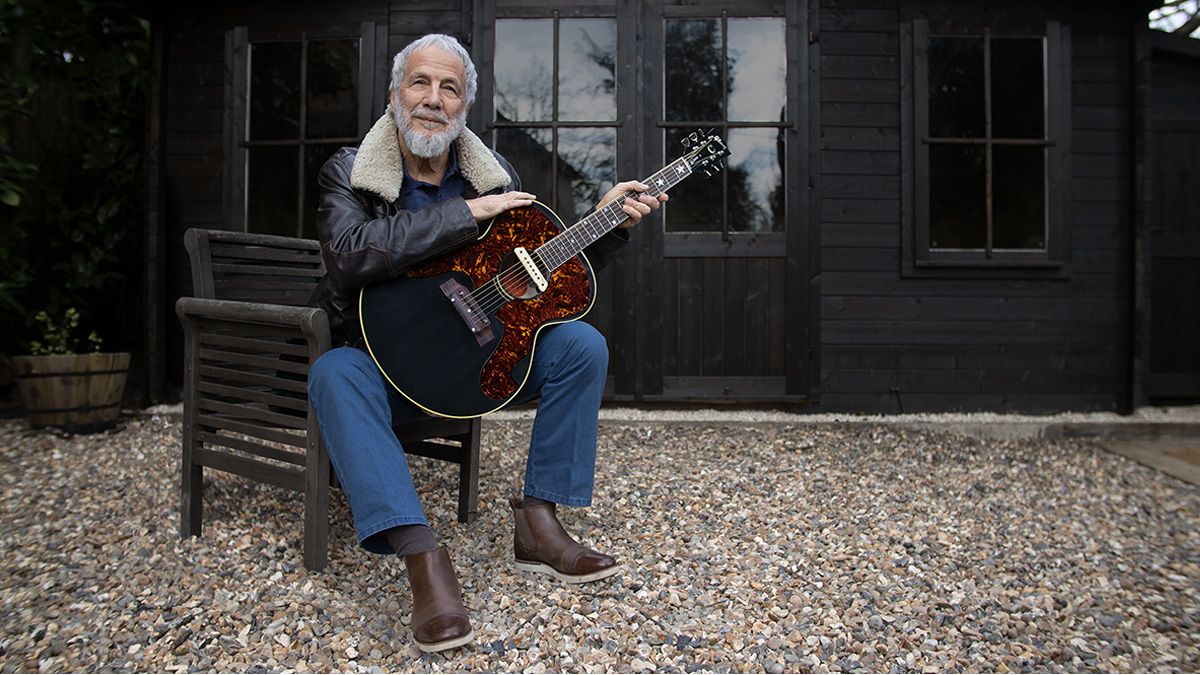 Cat Stevens with his signature Gibson J-180CE