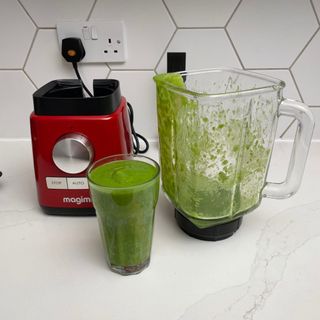 Blended ice and spinach smoothie in Magmix Power Blender