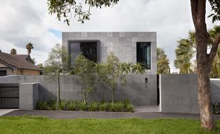 The facade and front wall in grey bluestone