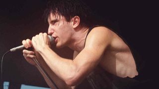 Trent Reznor of Nine Inch Nails singing onstage