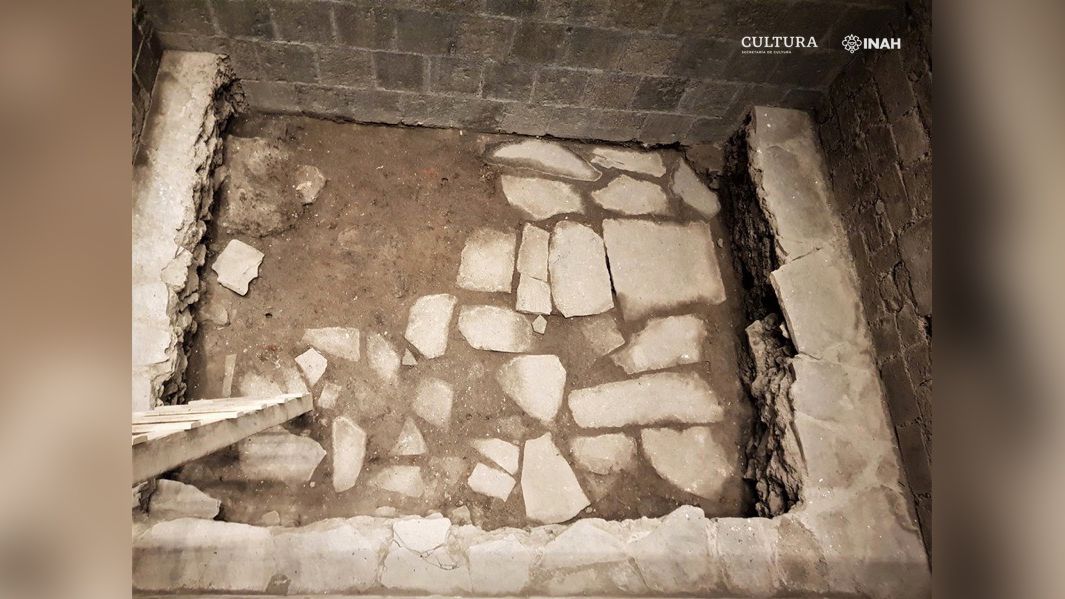 Archaeologists found the remains of a basalt slab floor from the Aztec palace.