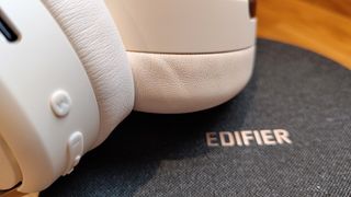 Edifier WH950NB review; headphones on a grey textured case