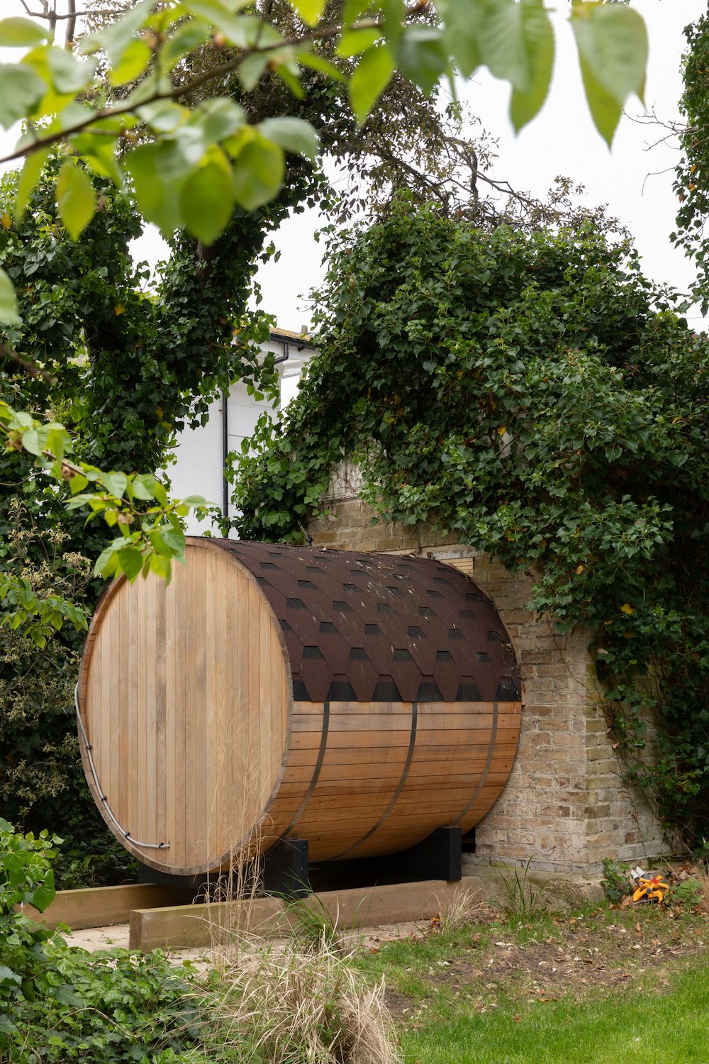 A circular water tank made from timber