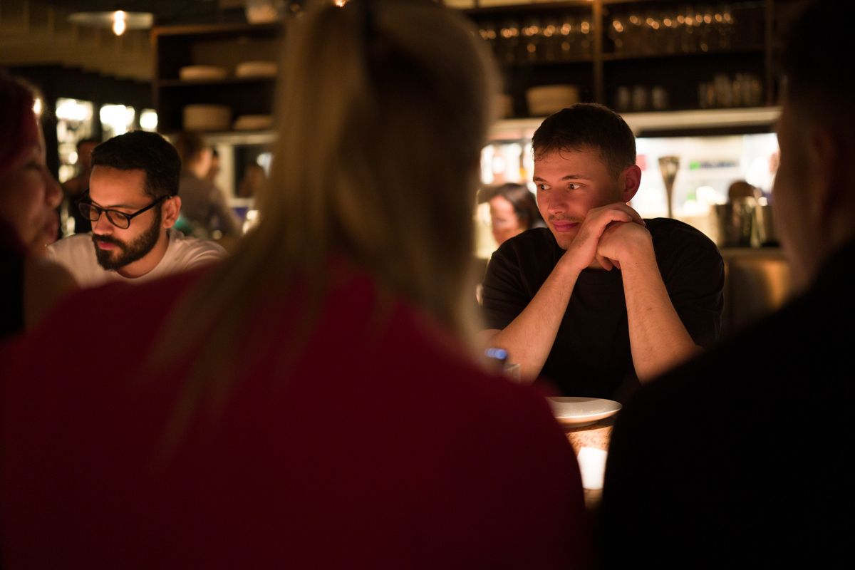 Sigma FP2 sample gallery: man sat at a table in a restaurant