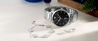 Silver bracelet, earrings and watch sold at Beaverbrooks