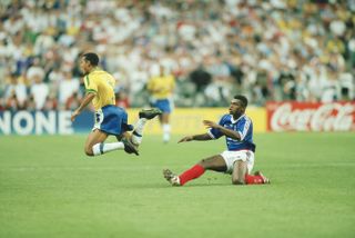 France's Marcel Desailly brings down Brazil's Cafu in the 1998 World Cup final.