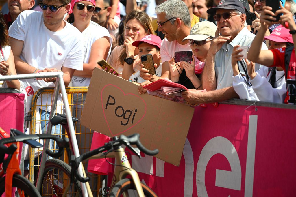 ROME ITALY MAY 26 Fans of Tadej Pogacar of Slovenia and UAE Team Emirates Pink Leader Jersey prior to the 107th Giro dItalia 2024 Stage 21 a 125km stage from Rome to Rome Palazzo della Civilt Italiana UCIWT on May 26 2024 in Rome Italy Photo by Dario BelingheriGetty Images