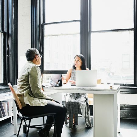 A woman meets with her financial advisor