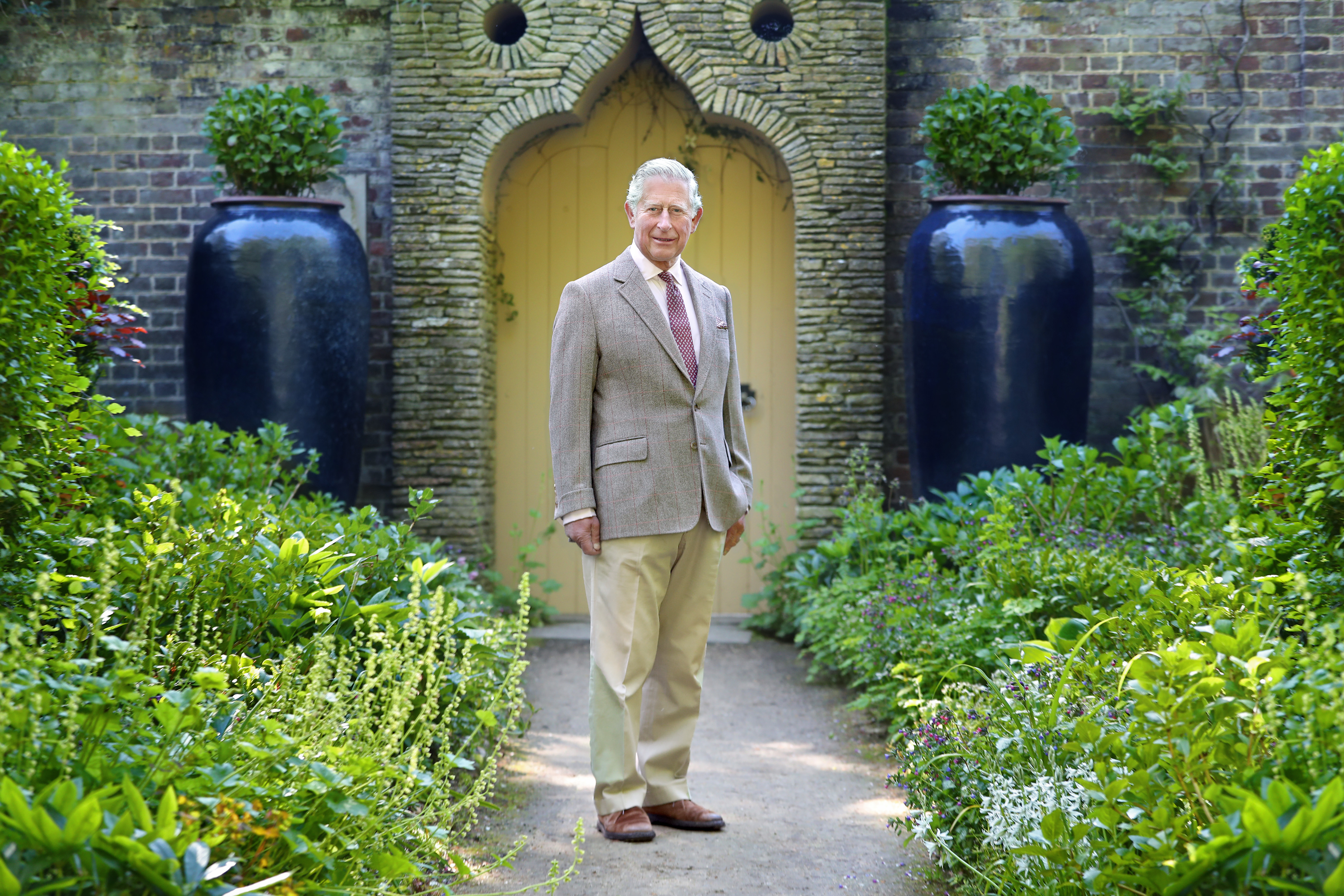 King Charles poses as his private property, Highgrove House