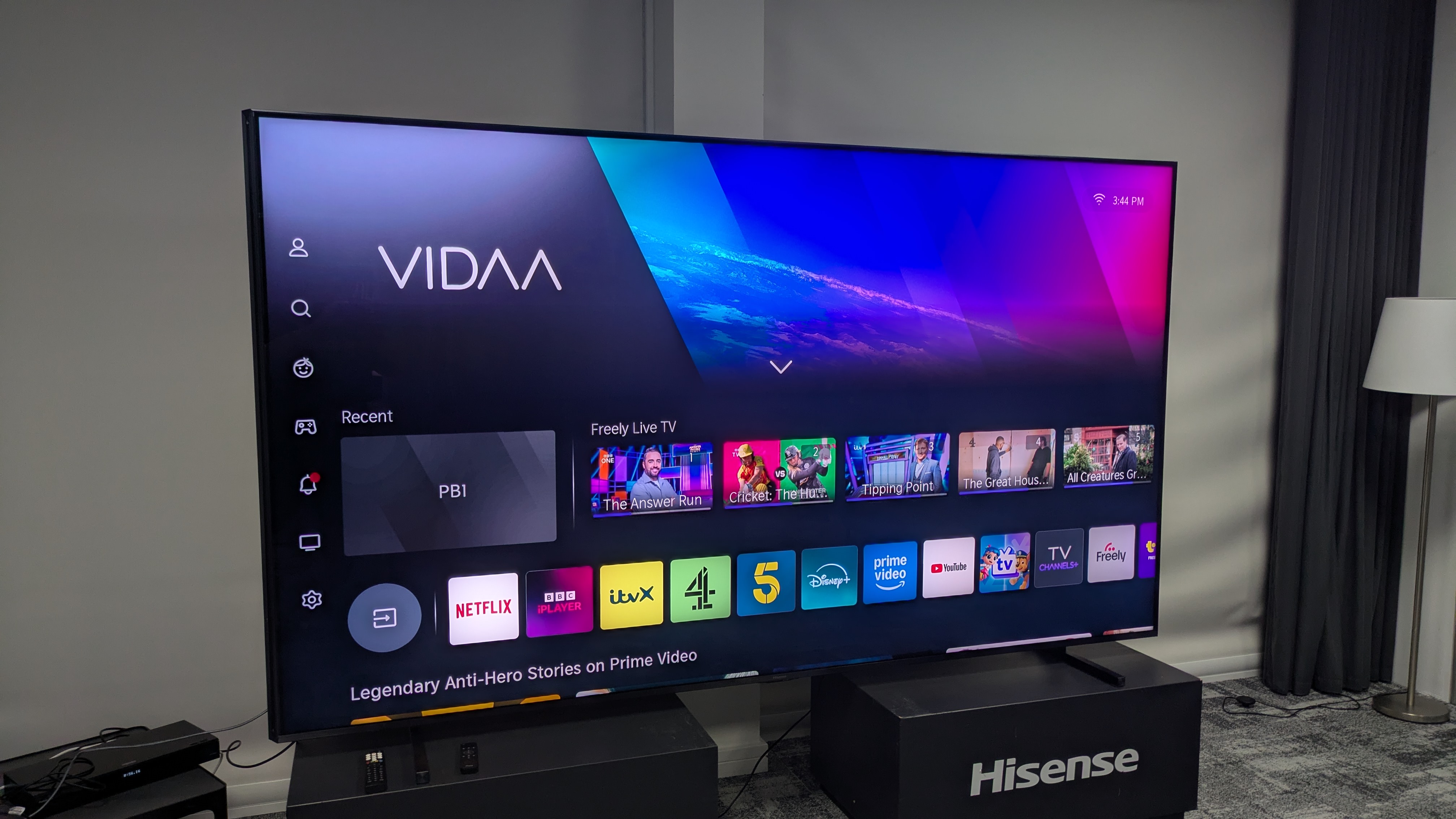 Hisense 116UX with VIDAA home screen on display