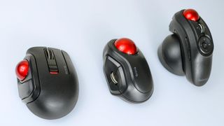 A picture showing three models of travel trackball mice from Elecom