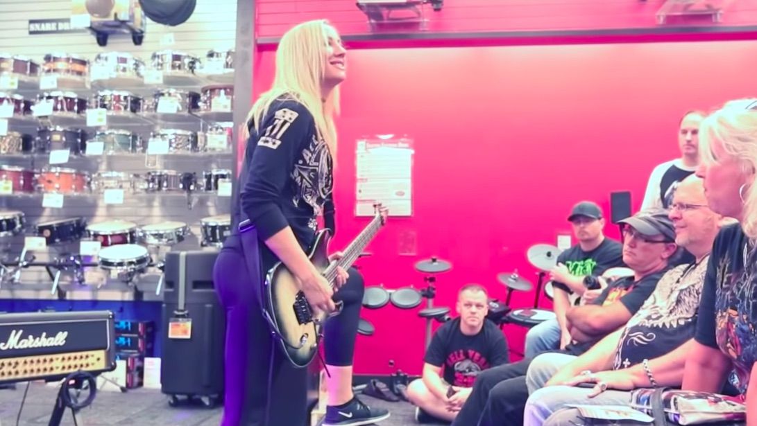 Watch Nita Strauss Conduct a Guitar Center in New 'Road to