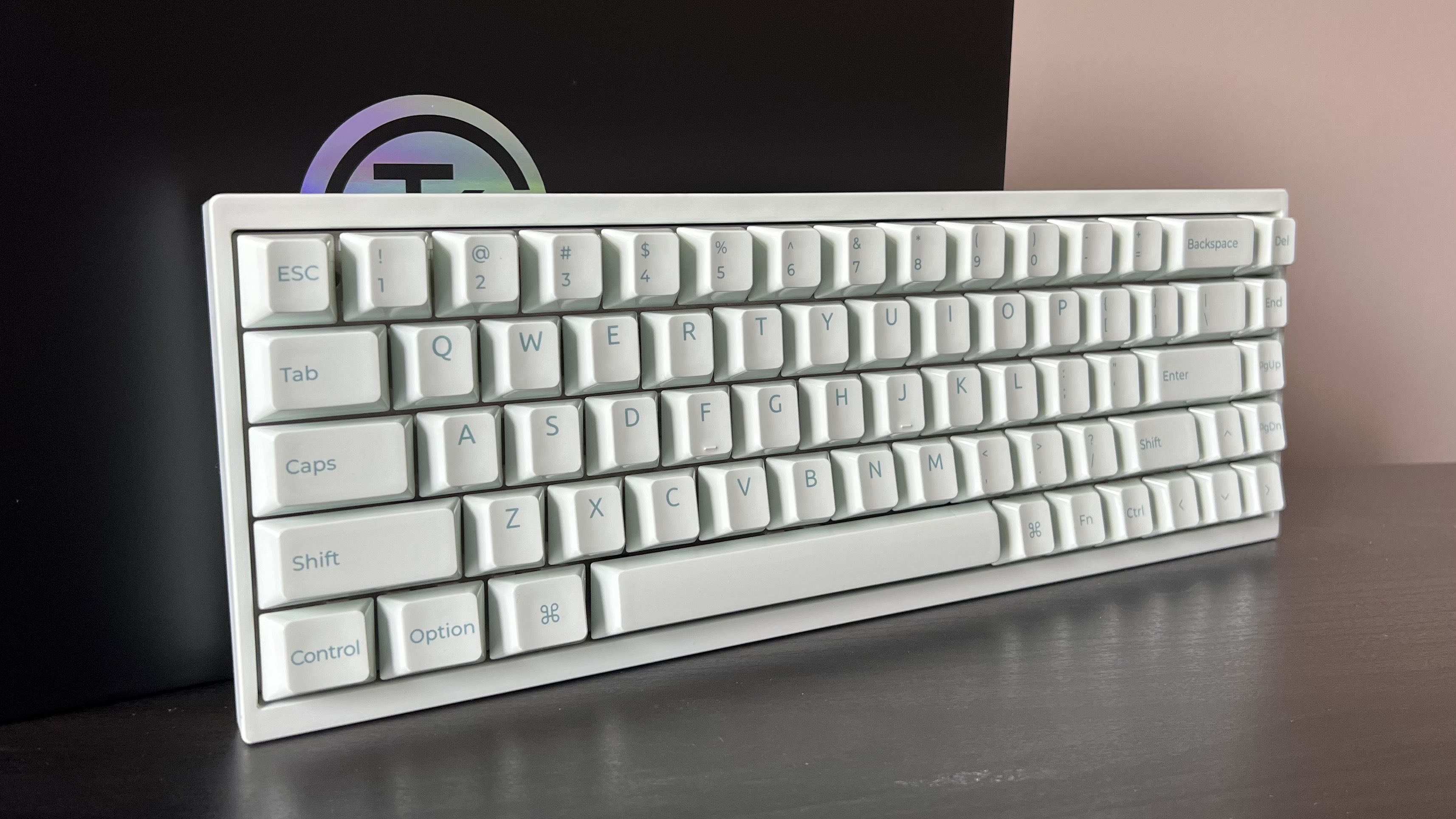 Mint green Keychron Q16 HE 8K gaming keyboard on a black desk