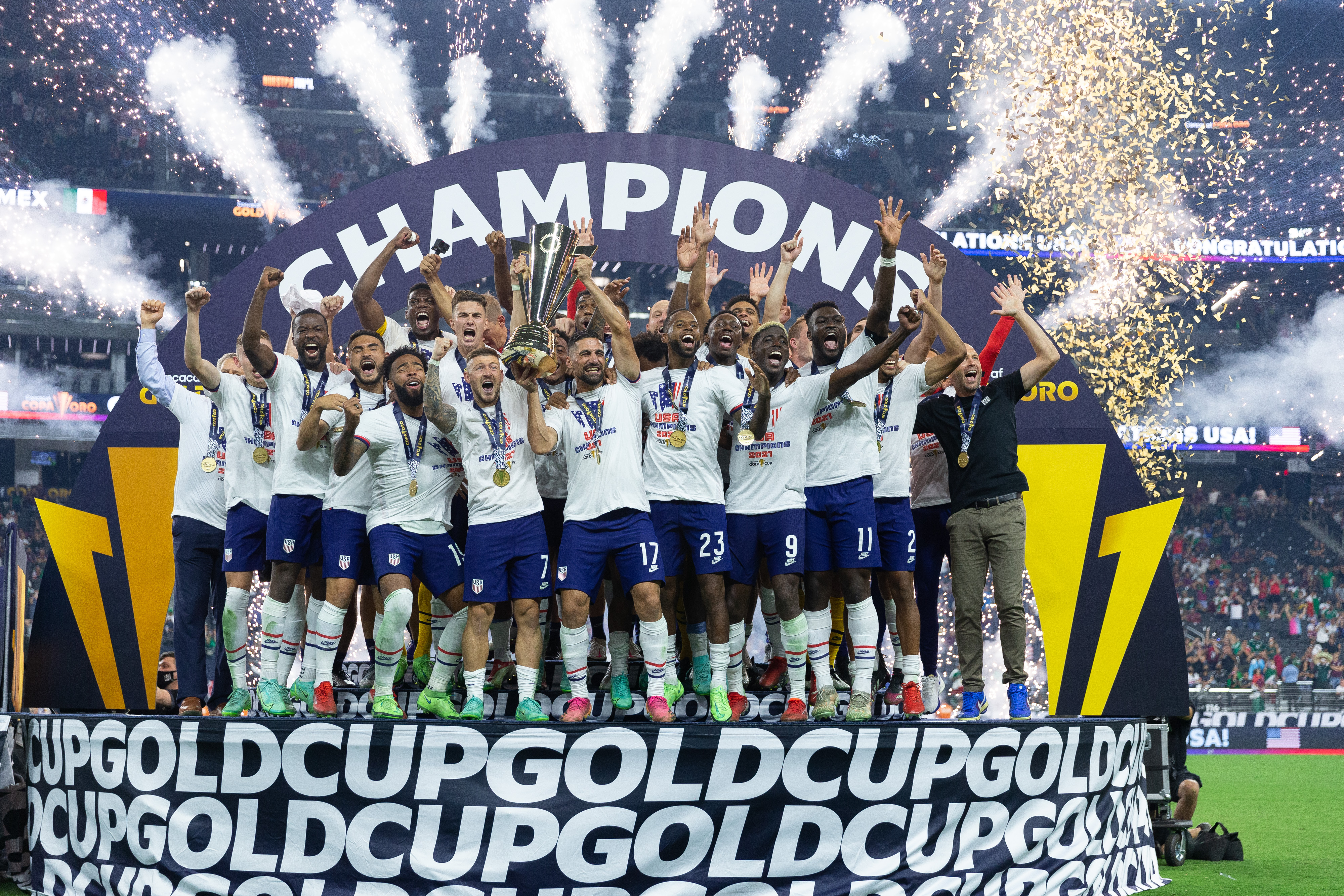 USMNT players celebrate after winning the CONCACAF Gold Cup in August 2021.