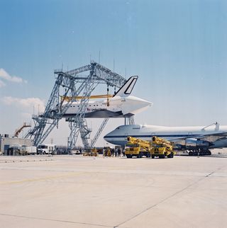 OV-105 Endeavour is mated to the Shuttle Carrier Aircraft (SCA) at Rockwell Palmdale facility on May 1, 1991.