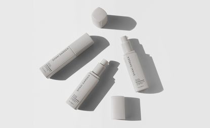 Los Angeles facialist and retinol expert Shani Darden’s skincare range, grey bottles against a grey background