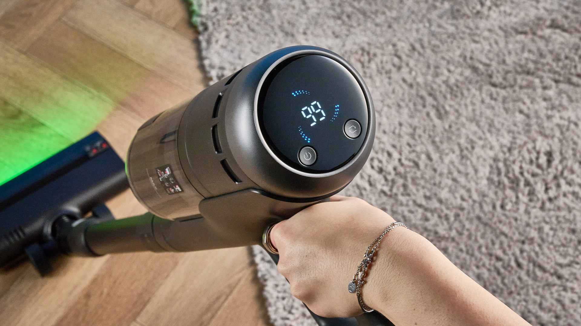 Roborock H60 Hub Ultra photograped in front f a blue background