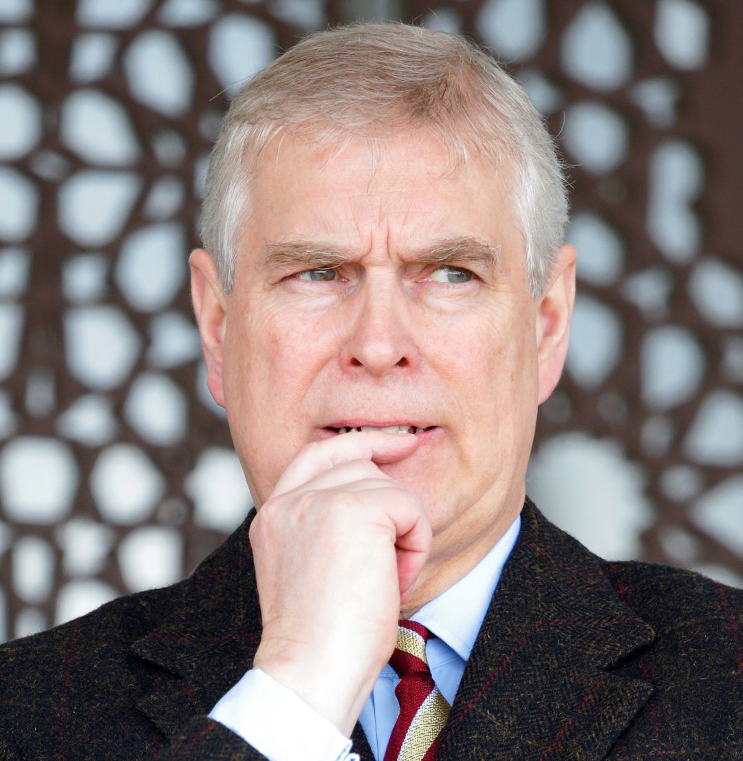 Prince Andrew putting his finger to his mouth