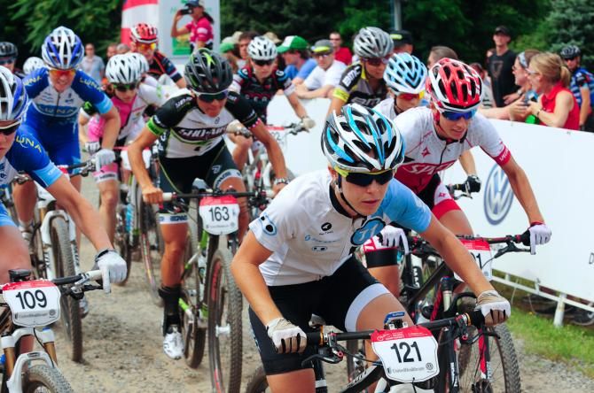 Chloe Woodruff (Crank Brothers) takes the hole shot and stays in the lead for the first part of the race
