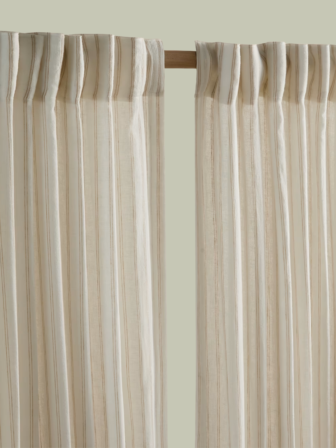 A pair of striped semi-sheer curtains