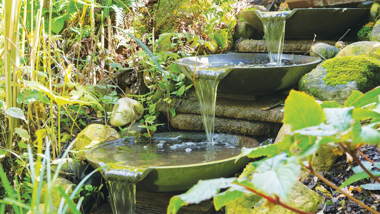 Water feature made up of three ornamental bowls