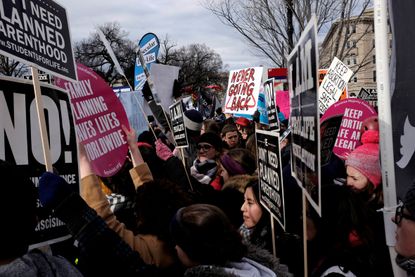 Pro-choice and pro-life activist clash.