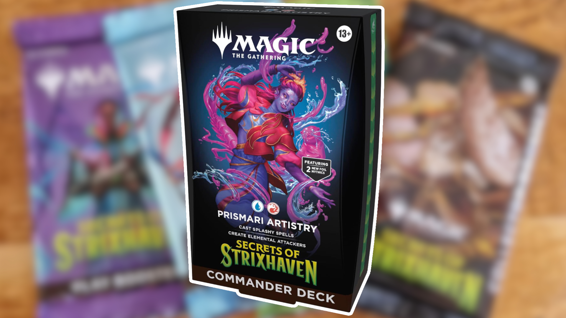 Prismari Artistry deck on a blurred background of MTG Secrets of Strixhaven boosters