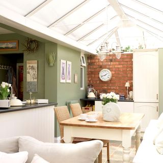 Broken plan kitchen diner with the dining area in a conservatory