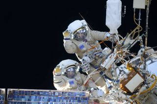 Mikhail Kornienko works outside the International Space Station on the August 10 spacewalk.