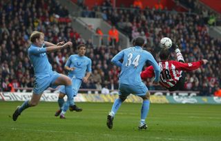 Rory Delap scores an overhead kick for Southampton against Tottenham in March 2004.