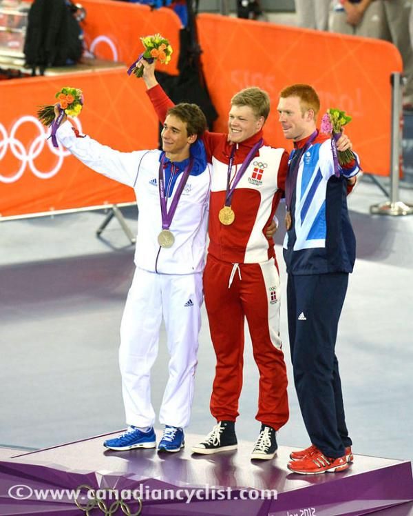 Lasse Norman Hansen (Denmark) flanked by Bryan Coquard (France) and Ed Clancy (Great Britain) on the men's omnium podium.
