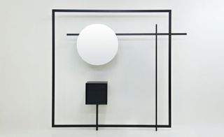 Black wall-mounted storage system