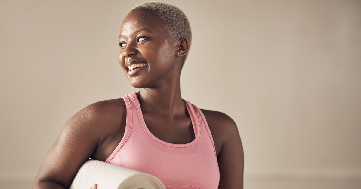 Yoga for flexibility: A woman working out with a yoga mat