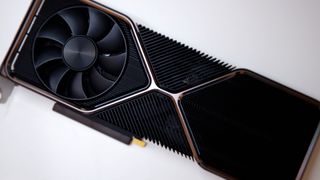 Nvidia GeForce RTX 3080 Ti Founders Edition graphics cards from various angles on a desk