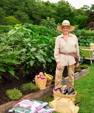 Martha Stewart in her garden with miracle grow soil